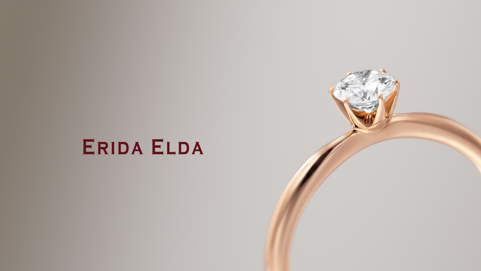 エリーダエルダを象徴するローズゴールドと天然ダイヤの指輪。ブランドロゴ入りの高級感あるトップイメージ